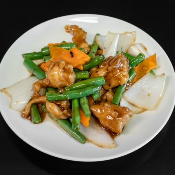 My City Chinese Foods' chicken stir-fry with green beans, carrots, and onions on a white plate.
