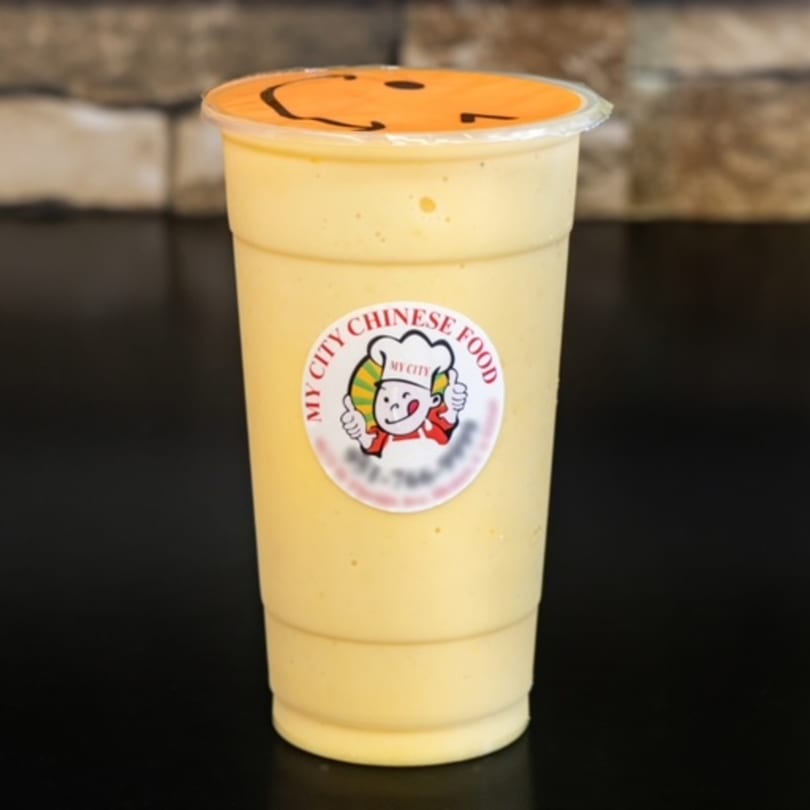 A My City Chinese Food branded cup of yellow smoothie with a smiley face lid.